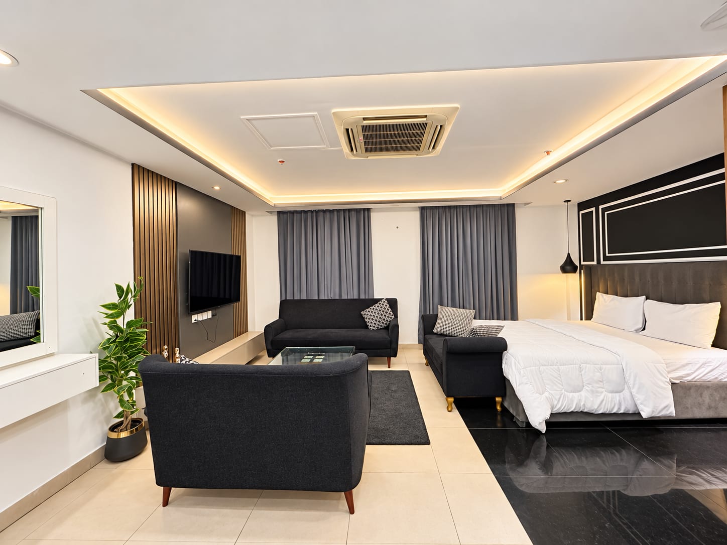 Bed with Sofa and Media Wall